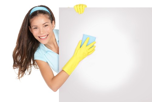 Cleaner treating mattress stains in a Stockwell flat